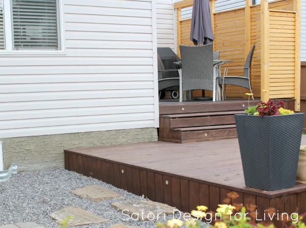 Tiered Deck with Cedar Privacy Screen and Built-in Lights