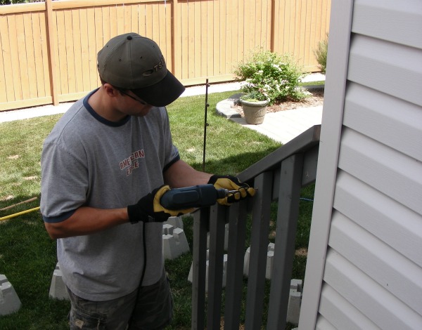 Getting Rid of the Orange Stained Fence - BEFORE