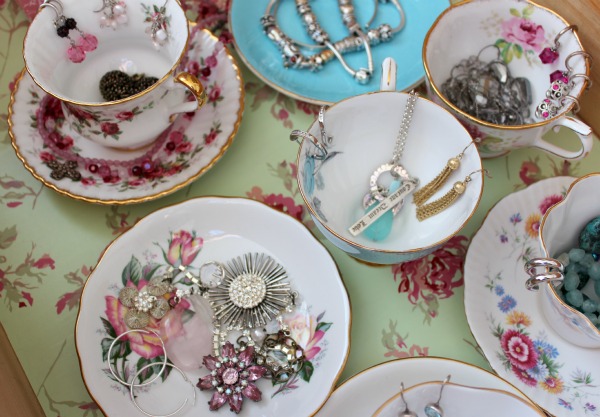 Tea Cups and Saucers Filled with Jewelry in Dresser Drawer