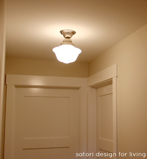 Semi-flush Schoolhouse Light Fixture in Basement Hallway