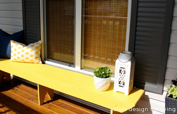 Yellow Bench and Potted White and Green Begonias 