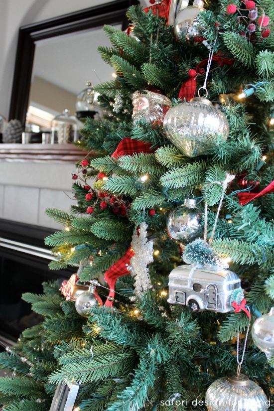 Decorating the Christmas Tree with Red and Silver Ornaments