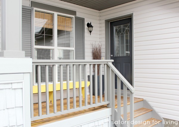 Grey Front Porch with Bright Yellow Bench