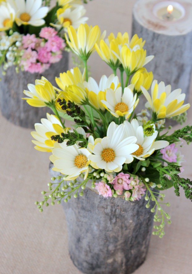 Table Centerpieces Made with DIY Log Vases and Garden Flowers - Garden Party Centerpiece Ideas