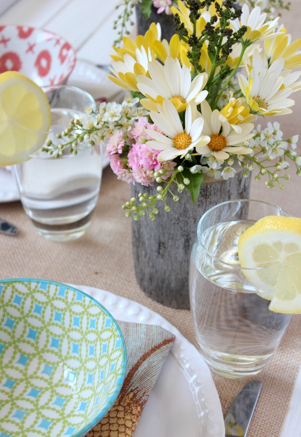 Outdoor Table Centerpieces with DIY Log Vases Filled with Bohemian Flowers 