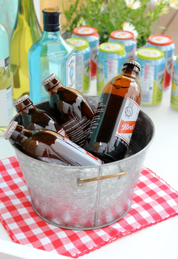 Galvanized Bucket of Ice Cold Beer on Outdoor Bar Cart