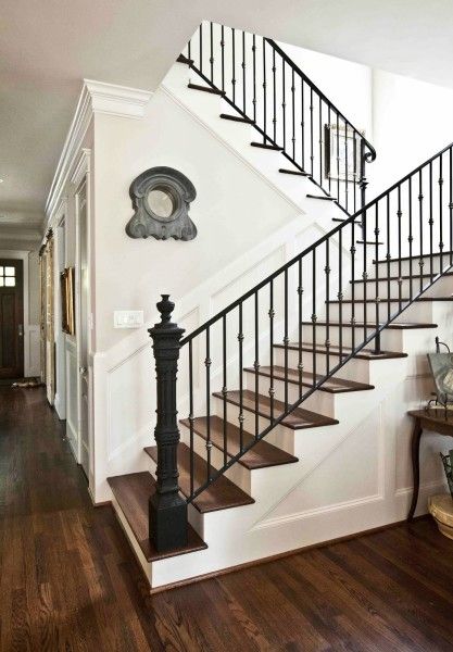 Staircase With Hardwood Treads and White Risers