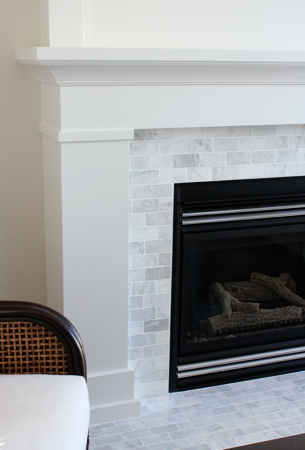 White Dove Painted Fireplace with Marble Subway Tile Surround 