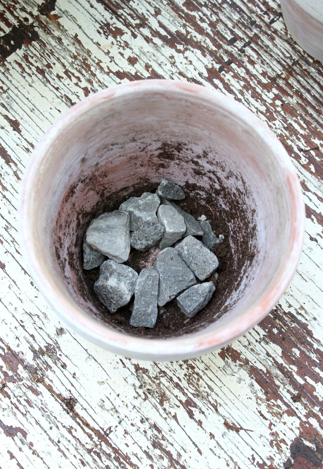 Aged Terracotta Pot with Rocks in Bottom