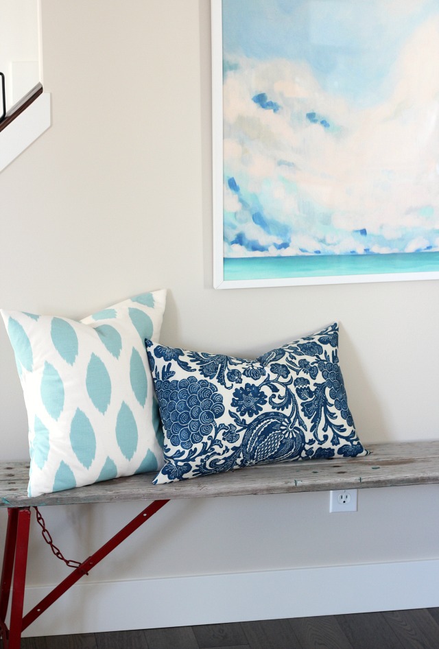 DIY Blue Chinoiserie Pillow Covers with Oversized Abstract Art Above Red Vintage Bench