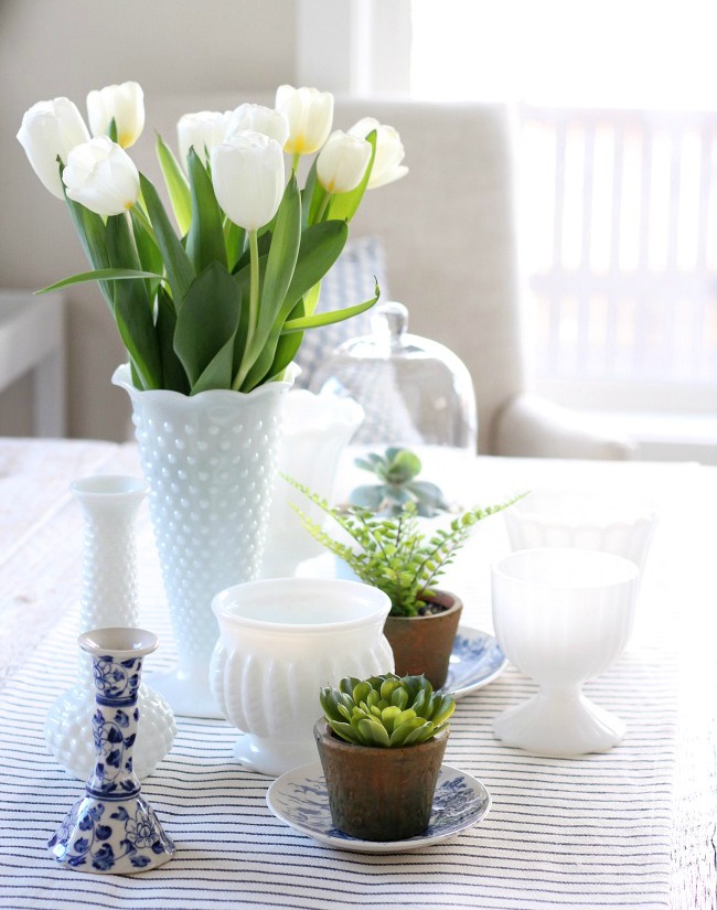 Spring Table with Vintage Milk Glass Vases, Tulips and Greenery