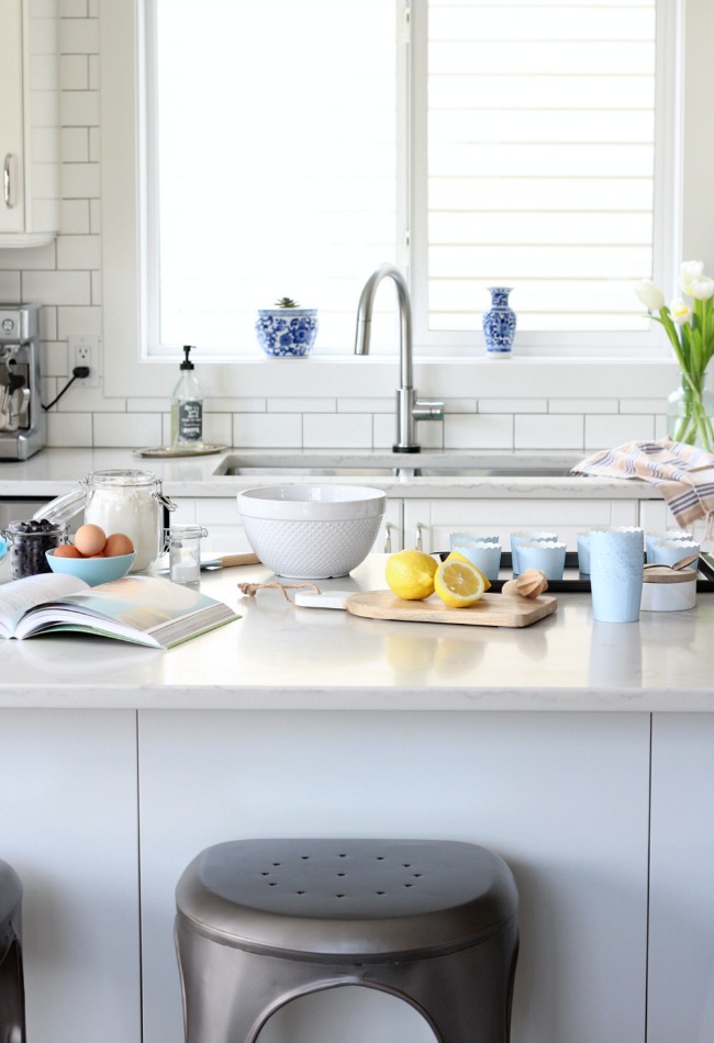 Classic White Kitchen with IKEA Bodbyn Cabinets, Marble Quartz Countertop and White Subway Tile Backsplash