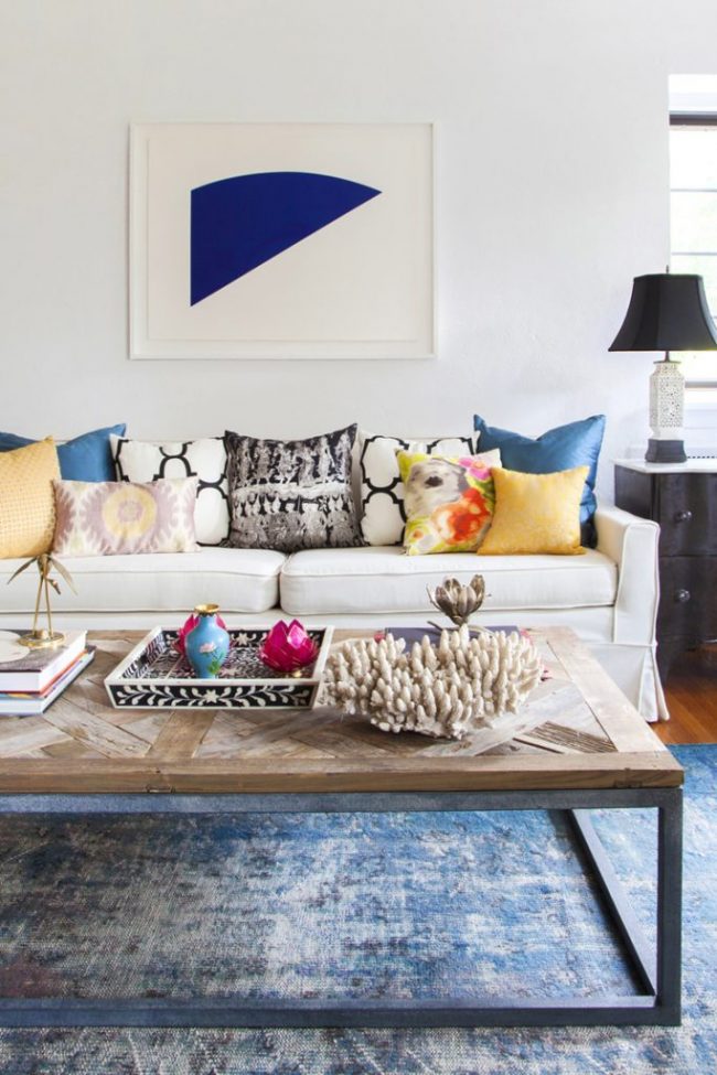 Eclectic Pillows on White Sofa - Design Manifest