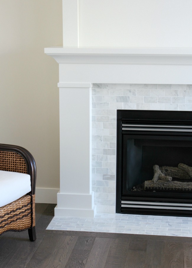 Shaker Style Fireplace with White Painted MDF Mantel and Marble Subway Tile Surround