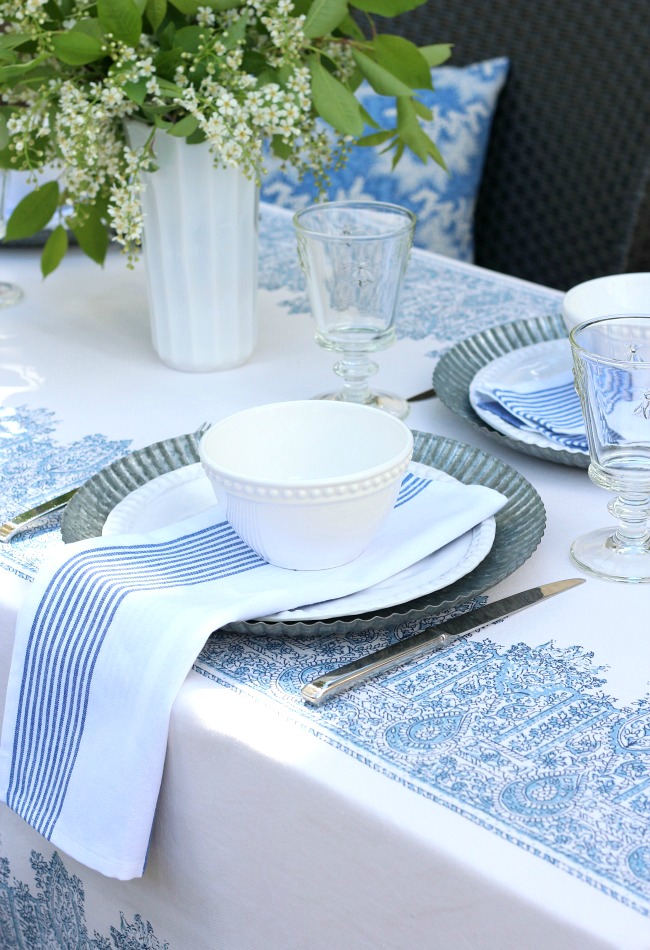 Blue and White Outdoor Tablescape with Milk Glass Vase