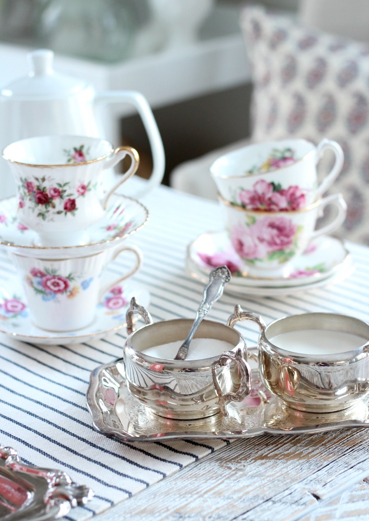 GALentine's Day Tea Party Decor with Vintage Floral Tea Cups and Silver Trays 