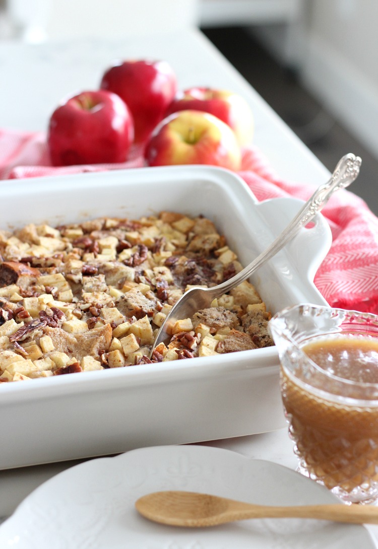 Apple Cinnamon Multigrain Bread Pudding with Salted Caramel Sauce in White Baking Dish