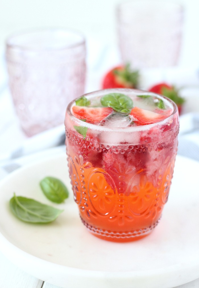 Honey Strawberry Basil Smash Poolside Drink in Pink Pressed Glass