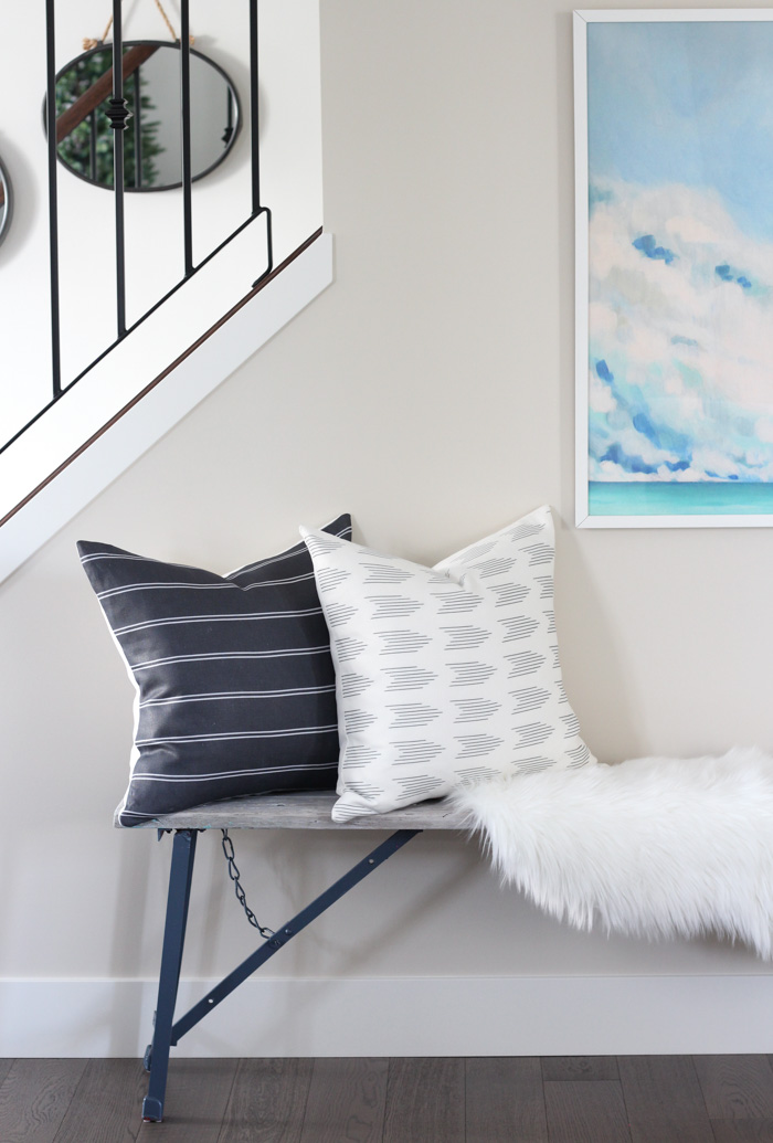 Rustic Bench Styled with Pillows, Oversized Art and Faux Sheepskin