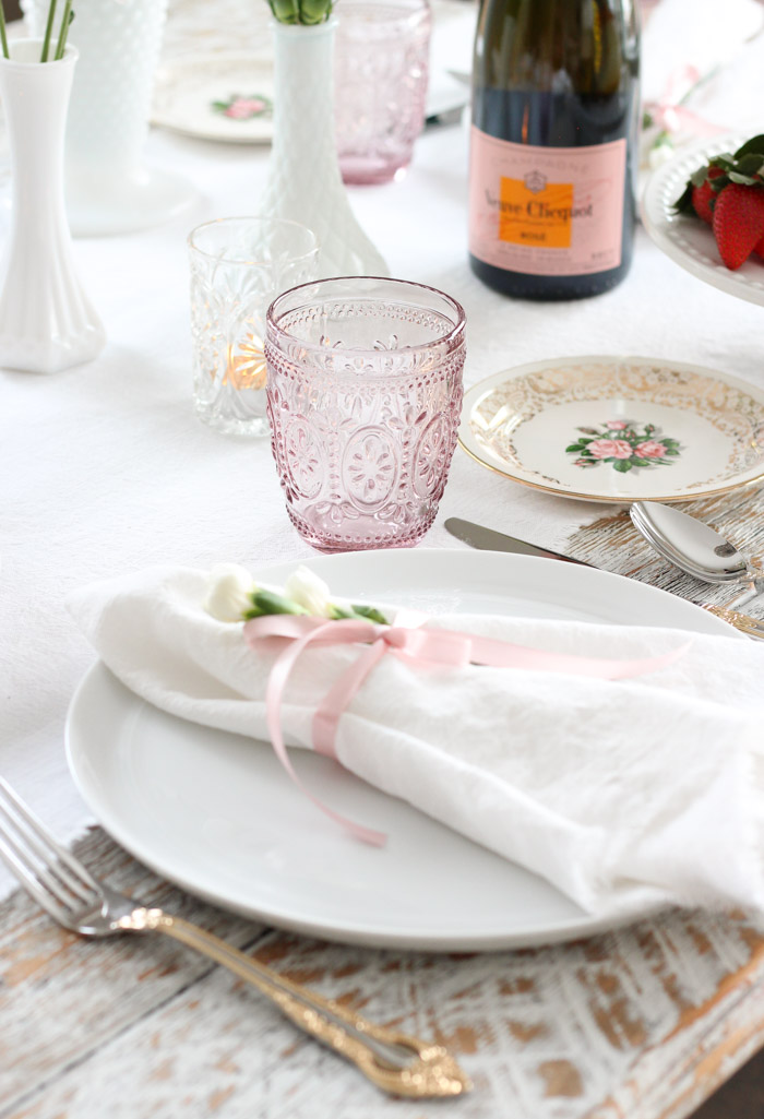 Valentine's Day Table Setting with Pink Drink Glasses and Vintage Pink Floral Dessert Plates