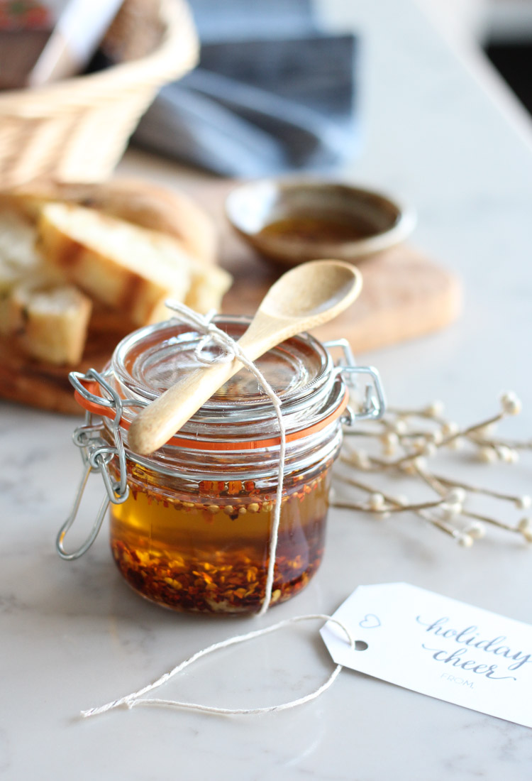 Chili Garlic Infused Olive Oil in Jar with Bamboo Spoon