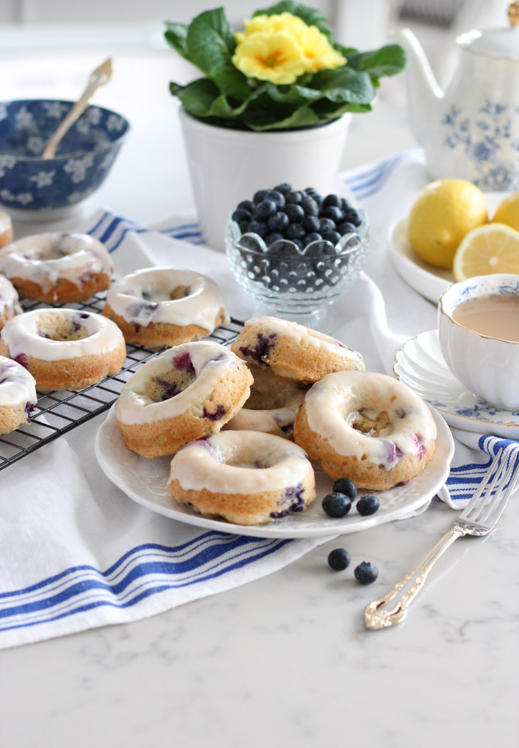 Blueberry Donuts with Lemon Glaze on White Plate