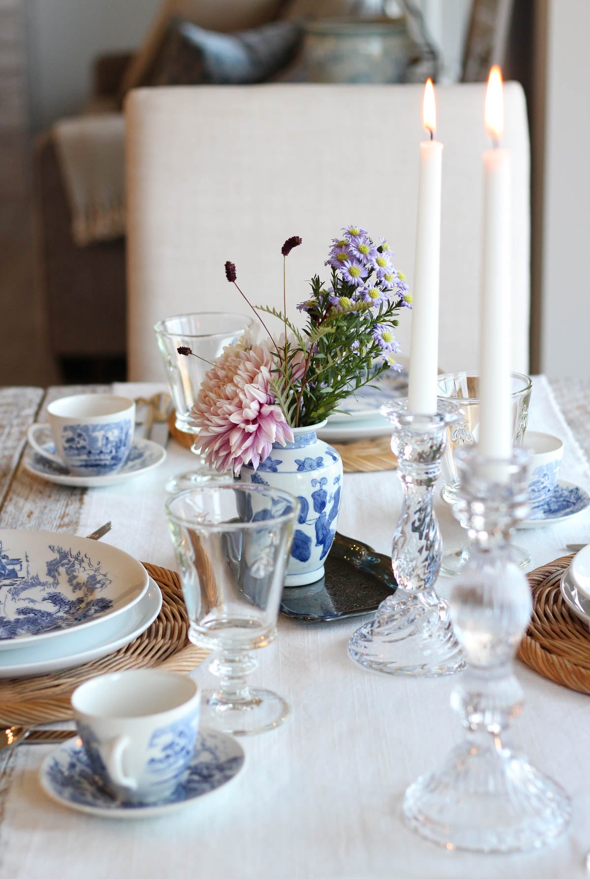 Table set with vintage blue and white Countryside plates and tea cups